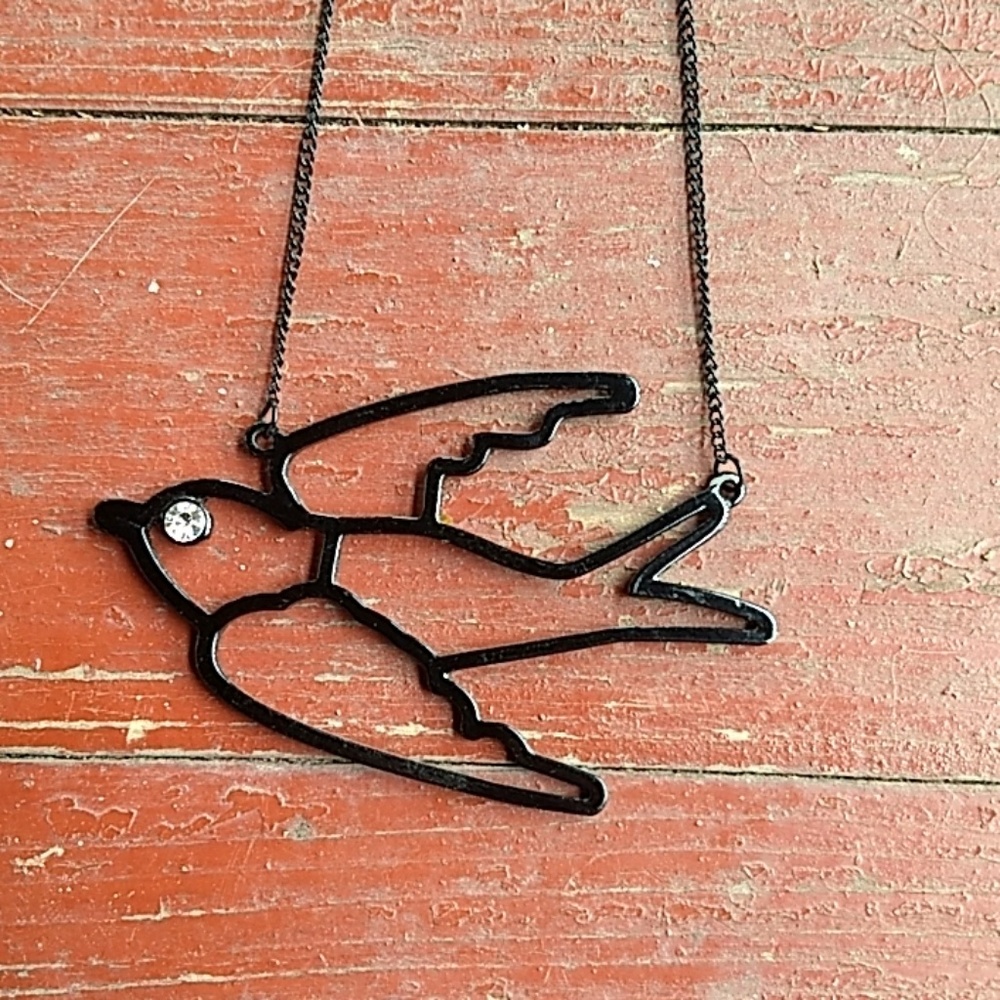 Flying bird statement necklace